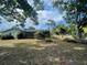 Well-maintained backyard with a screened-in lanai offering a peaceful outdoor retreat at 1001 Arden St, Longwood, FL 32750
