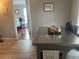 Cozy breakfast nook area with bar stool seating and a view to the primary bedroom at 1001 Arden St, Longwood, FL 32750