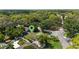 This aerial view showcases the home's location, surrounded by lush greenery and nearby roads at 101 E Lauren Ct, Fern Park, FL 32730