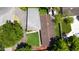 Birds eye view showing the roof, manicured lawn, and some surrounding greenery of the property at 101 E Lauren Ct, Fern Park, FL 32730