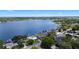 Wide aerial view showcasing waterfront properties with boat docks and mature trees surrounding the community at 101 E Lauren Ct, Fern Park, FL 32730