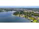 Scenic aerial view of a waterfront community nestled along the tranquil lake at 101 E Lauren Ct, Fern Park, FL 32730