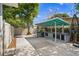 The outdoor kitchen has a stainless steel grill, a prep area, and a sink for summer barbecues at 101 E Lauren Ct, Fern Park, FL 32730