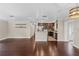 Spacious living room with hardwood floors, neutral paint, open floor plan, and plenty of natural light at 101 E Lauren Ct, Fern Park, FL 32730