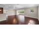 Spacious living room with hardwood floors, neutral paint, and lots of natural light at 101 E Lauren Ct, Fern Park, FL 32730