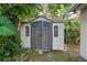A spacious storage shed offers extra storage space for tools and lawn equipment at 101 E Lauren Ct, Fern Park, FL 32730