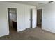Bright bedroom with access to the bathroom and closet at 10128 Hartford Maroon Rd, Orlando, FL 32827