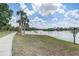Lakeside beach and path offer relaxation and recreational activities at 1041 Park Ridge Cir, Kissimmee, FL 34746