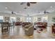 Spacious clubhouse lounge featuring comfortable seating arrangements, ceiling fans and abundant natural light at 1041 Park Ridge Cir, Kissimmee, FL 34746