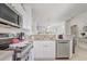 Functional kitchen with stainless steel appliances and a convenient breakfast bar at 1041 Park Ridge Cir, Kissimmee, FL 34746