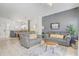 Comfortable living room, featuring neutral tones, modern decor, and an inviting atmosphere at 1041 Park Ridge Cir, Kissimmee, FL 34746
