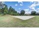 Sandy volleyball court and playground for outdoor fun and activities at 1041 Park Ridge Cir, Kissimmee, FL 34746
