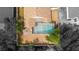Aerial view showing a home with a screened pool and surrounding greenery, offering a private outdoor space at 11113 Sylvan Pond Cir, Orlando, FL 32825