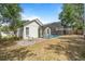 Picturesque backyard featuring a screened pool, perfect for outdoor enjoyment and relaxation at 11113 Sylvan Pond Cir, Orlando, FL 32825