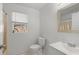 Well-lit bathroom with a window and vanity at 11113 Sylvan Pond Cir, Orlando, FL 32825