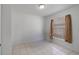 Well-lit bedroom showcasing tiled floors and a window with privacy blinds at 11113 Sylvan Pond Cir, Orlando, FL 32825
