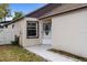 Charming entrance with tiled walkway and decorative details at 11113 Sylvan Pond Cir, Orlando, FL 32825