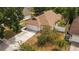 Charming home with a well-maintained lawn and a two-car garage at 11113 Sylvan Pond Cir, Orlando, FL 32825