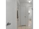 Clean and bright hallway leading to bathroom and bedroom areas at 11113 Sylvan Pond Cir, Orlando, FL 32825