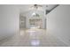 Bright and airy living room with high ceilings and views of the backyard pool at 11113 Sylvan Pond Cir, Orlando, FL 32825