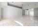 Spacious living room with tile flooring, neutral paint, and vaulted ceilings at 11113 Sylvan Pond Cir, Orlando, FL 32825