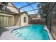 Inviting screened pool area with clear blue water and ample space for relaxation and entertainment at 11113 Sylvan Pond Cir, Orlando, FL 32825
