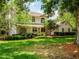 Beautiful two-story home with manicured lawn and lush landscaping at 11335 Winston Willow Ct, Windermere, FL 34786