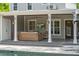Relaxing back porch with comfortable seating, ceiling fans, and outdoor television by the pool at 1207 W New Hampshire St, Orlando, FL 32804