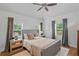 Comfortable bedroom with a neutral color palette and natural light at 1207 W New Hampshire St, Orlando, FL 32804