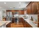 Updated kitchen with stainless steel appliances and marble countertops at 1207 W New Hampshire St, Orlando, FL 32804