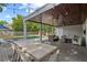 Outdoor pool with a dining table and string lights at 1207 W New Hampshire St, Orlando, FL 32804