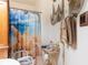 Nautical-themed bathroom with decorative accents and shower at 1219 Blue Spring Ct, Ocoee, FL 34761