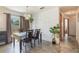 Dining room with sliding door to the back yard and decorative accents at 1219 Blue Spring Ct, Ocoee, FL 34761