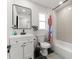 Stylish bathroom featuring a modern vanity, black fixtures, and a shower/tub combo at 13 Fanfair Ave, Orlando, FL 32811