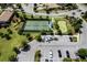 Overhead view showcasing the tennis court, putting green, and convenient parking at the community at 1300 Island Green St, Davenport, FL 33896