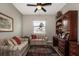 Cozy living room with comfortable seating, perfect for relaxing or entertaining guests at 1300 Island Green St, Davenport, FL 33896