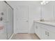 Modern bathroom with a double sink vanity and glass-enclosed shower, offering a spa-like experience at 1312 Axel Graeson Ave, Kissimmee, FL 34744
