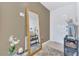 Inviting entryway featuring a large mirror and decorative accents, setting a welcoming tone at 1312 Axel Graeson Ave, Kissimmee, FL 34744