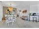 Open floor plan seamlessly connecting the living and dining areas for easy entertaining at 1312 Axel Graeson Ave, Kissimmee, FL 34744