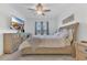 Spacious main bedroom with a large window for natural light and outdoor views at 1312 Axel Graeson Ave, Kissimmee, FL 34744
