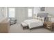 Serene bedroom with a luxurious bed, soft lighting, and tasteful furnishings at 13248 Pergola Ave, Orlando, FL 32832
