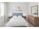 Comfortable bedroom with a large window, providing plenty of natural light at 13248 Pergola Ave, Orlando, FL 32832