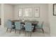 Elegant dining room with a large table and seating for eight, perfect for entertaining at 13248 Pergola Ave, Orlando, FL 32832