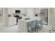 Modern kitchen with stainless steel appliances, a center island, and stylish countertops at 13248 Pergola Ave, Orlando, FL 32832