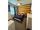 bedroom with nautical theme decor, including a custom painted wall, window, and furnishings at 13299 Serene Valley Dr, Clermont, FL 34711