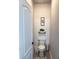 Charming half bathroom with shiplap accent wall and neutral decor at 13299 Serene Valley Dr, Clermont, FL 34711