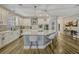 Stylish kitchen with ample counter space, an island, modern appliances, and custom cabinetry at 13299 Serene Valley Dr, Clermont, FL 34711