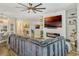 Spacious living room with modern fireplace and open layout at 13299 Serene Valley Dr, Clermont, FL 34711