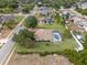 Spacious home with a screened pool, mature trees, and a well-kept lawn at 1441 Olde Kensington Ln, Deltona, FL 32725