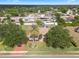 Charming home with mature landscaping, a beautiful palm tree, and brick accents at 1441 Olde Kensington Ln, Deltona, FL 32725
